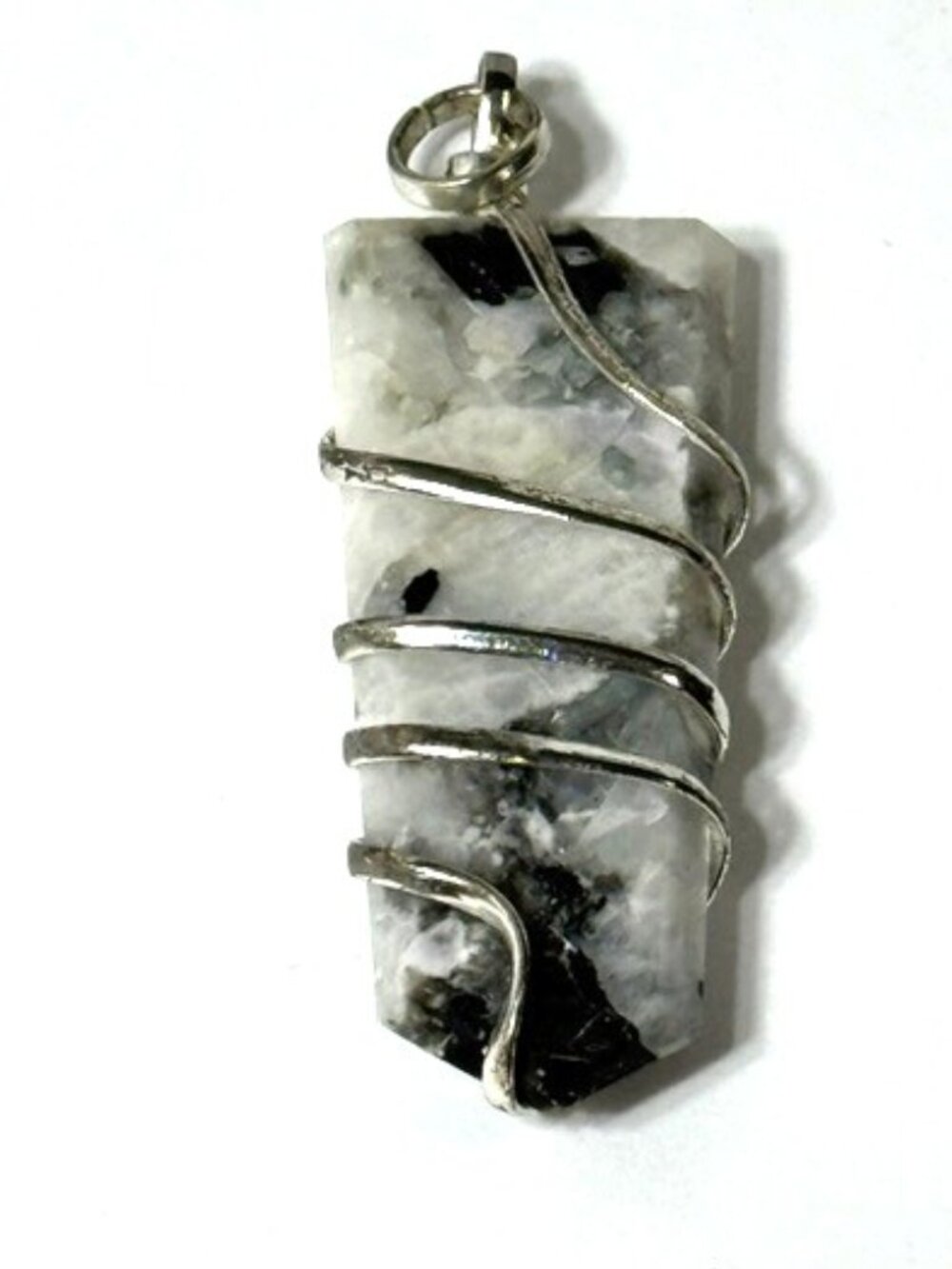 Moonstone flat coil silver pendant.